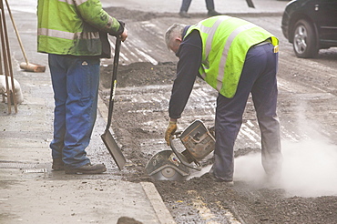 Roadworkers in Ambleside, Cumbria, England, United Kingdom, Europe