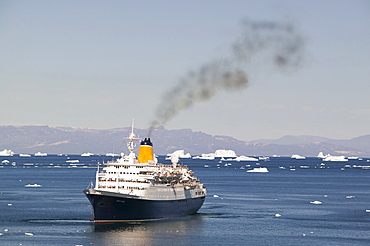 A cruise ship off Ilulissat, UNESCO World Heritage Site, Greenland, Polar Regions