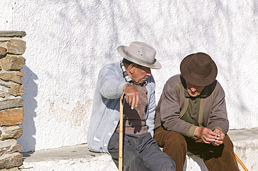 Old men in a village square in Andalucia, Spain, Europe