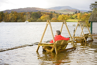 Flooding in the beer garden of the Wateredge Inn at Waterhead on Lake Windermere in Ambleside, Lake District National Park, Cumbria, England, United Kingdom, Europe