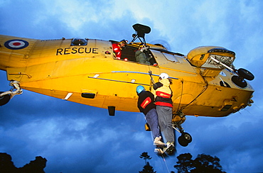 RAF Sea King Helicopter crew attend a mountain rescue incident in the Lake District, Cumbria, England, United Kingdom, Europe