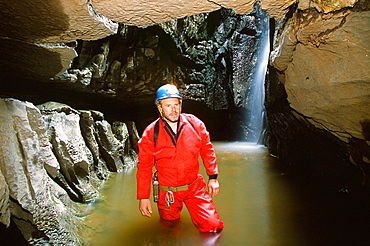 A caver in the Yorkshire Dales, Yorkshire, England, United Kingdom, Europe