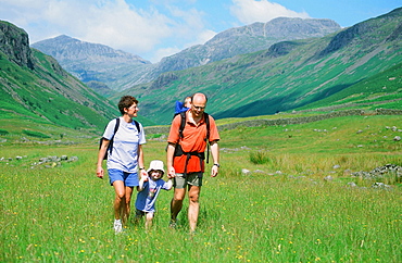 A family walking in Eskdale in the Lake District National Park, Cumbria, England, United Kingdom, Europe