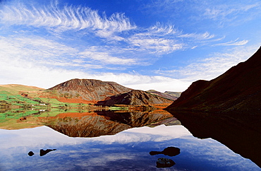 Autumn colours reflected in Ennerdale Lake in the Lake District National Park, Cumbria, England, United Kingdom, Europe