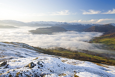 Valley mist over Ambleside from Wansfell Pike in the Lake District National Park, Cumbria, England, United Kingdom, Europe