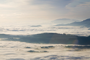 Valley mist over South Cumbria from Wansfell Pike in the Lake District National Park, Cumbria, England, United Kingdom, Europe