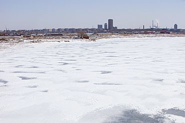 The Songhue river frozen solid in winter in Harbin, Heilongjian province, Northern China, Asia