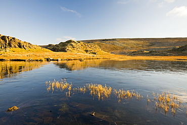 A frozen tarn on Dale Head in the Lake District above the Newlands Valley, Cumbria, England, United Kingdom, Europe