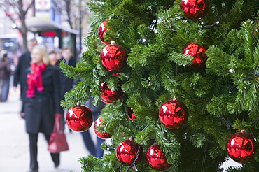 A Christmas tree outside a department store on Oxford Street in London, England, United Kingdom, Europe