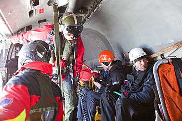 A Navy Sea King helicopter crew help to evacuate an injured walker in the Lake District, Cumbria, England, United Kingdom, Europe