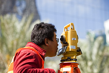 A surveyor working on a construction project in Dubai, United Arab Emirates, Middle East