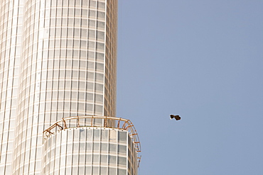 Rubbish floating past the Burj Dubai, the world's tallest building in Dubai, United Arab Emirates, Middle East