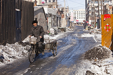 The polluted back streets of Suihua in Heilongjiang Province, China, Asia