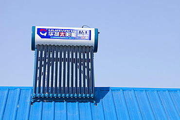 Solar water heater on roof of housing complex in Heilongjiang, Northern China, Asia