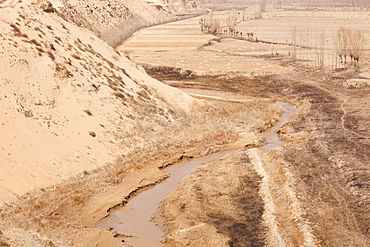 A critically low river in Shanxi province, China, Asia