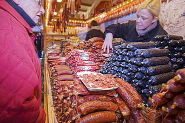 German sausages on a stall at the Christmas market outside Manchester Town Hall in Manchester, England, United Kingdom, Europe