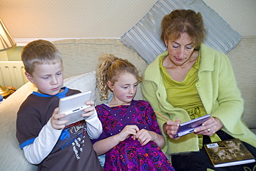 A family playing computer games on a console