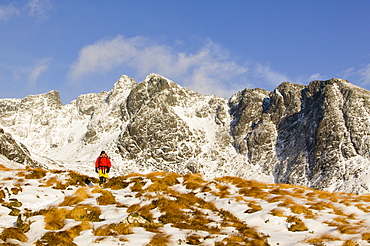 A climber walking out from the Cuillin Ridge on the Isle of Skye, Scotland, United Kingdom, Europe