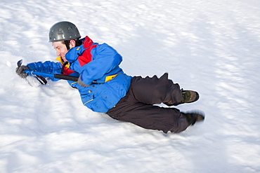 A group of mountaineers practise ice axe arrests on Cairngorm in the Cairngorm National Park in Scotland, United Kingdom, Europe