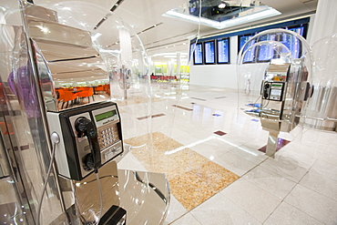 Phone booths in Dubai's airport terminal building, Dubai, United Arab Emirates, Middle East