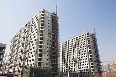 Modern high-rise apartments built to replace slums, China, Asia