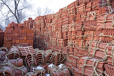 Roof tiles baked from earth deposits in northern China, Asia