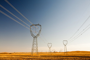 Electricity pylons march across Inner Mongolia in Northern China, Asia