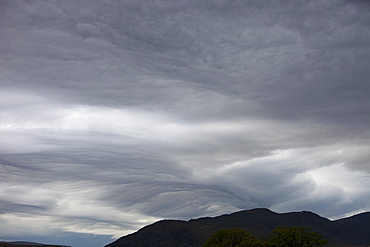 Patterns in cloud on an occluded front over the Lake District hills in Ambleside, Cumbria, England, United Kingdom, Europe