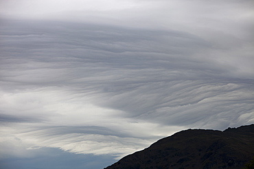 Patterns in cloud on an occluded front over the Lake District hills in Ambleside, Cumbria, England, United Kingdom, Europe