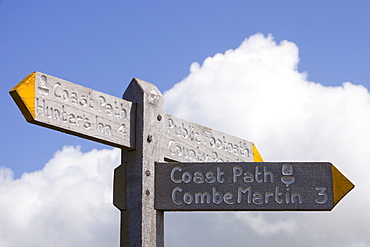 Signpost marking the way to Combe Martin. South West coast Path near Combe Martin in Devon, England, United Kingdom, Europe