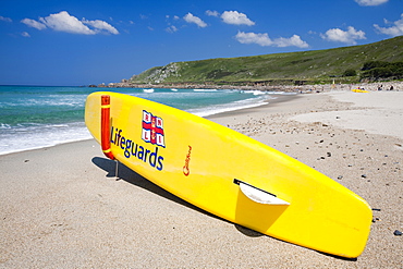 A lifeguard's surf board on the beach at Nanven Cove in Cornwall, England, United Kingdom, Europe