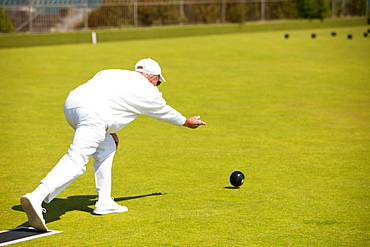 Man playing bowls at Penzance in West Cornwall, England, United Kingdom, Europe