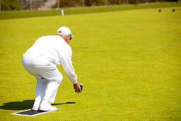 Man playing bowls at Penzance in West Cornwall, England, United Kingdom, Europe