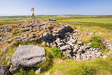 Hut circles and tumuli overlookng Lands End in Cornwall, England, United Kingdom, Europe