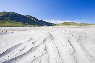 Sand dunes blown and shaped by the wind on an outwash plain below the Russell Glacier near Kangerlussuaq in Greenland, Polar Regions