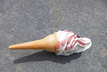 An ice cream melting on the shores of Lake Windermere, Cumbria, England, United Kingdom, Europe