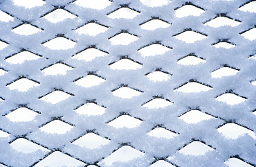 Snow settling on a fence, United Kingdom, Europe