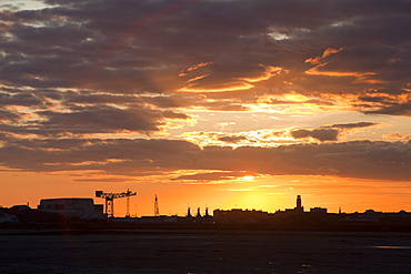 Sunset over Barrow in Furness town and shipyard, Cumbria, England, United Kingdom, Europe