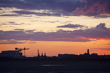 Sunset over Barrow in Furness town and shipyard, Cumbria, England, United Kingdom, Europe