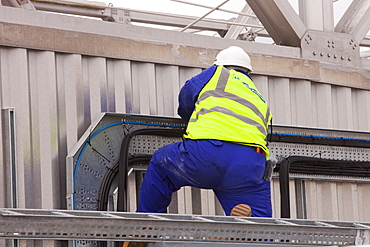 A contract worker at Daveyhulme wastewater treatment plant in Manchester, England, United Kingdom, Europe