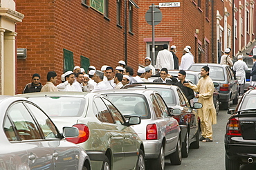 Muslims off to Friday prayers in the Asian area of Blackburn, Lancashire, England, United Kingdom, Europe