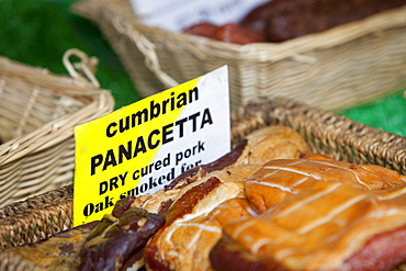 Pancetta ham on a farmers market in Kendal, Cumbria, England, United Kingdom, Europe