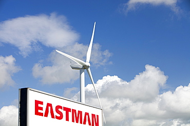 A 2 MW wind turbine producing renewable electricity in the grounds of the Eastman factory on the outskirts of Workington, Cumbria, England, United Kingdom, Europe