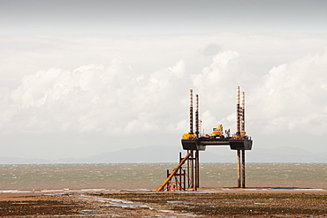 A jack up barge laying the onshore electricity cable from the Off shore wind farm, Robin Rigg, in the Solway Firth, north of Workington, Cumbria, England, United Kingdom, Europe