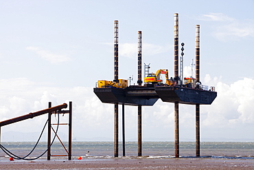 A jack up barge laying the onshore electricity cable from the Off shore wind farm, Robin Rigg, in the Solway Firth, north of Workington, Cumbria, England, United Kingdom, Europe