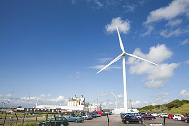 A 2 MW wind turbine producing renewable electricity in the grounds of the Eastman factory on the outskirts of Workington, Cumbria, England, United Kingdom, Europe