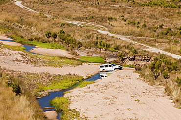 Off road vehicle at Lake Eildon after an uprecedented ten years of drought, with only 29 percent capacity, Victoria, Australia, Pacific