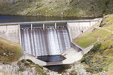 Guthega Dam supplying the water to power Guthega power station as part of the Snowy Mountains hydro scheme, New South Wales, Australia, Pacific