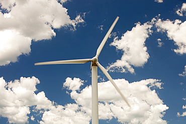 A lone wind turbine stands defiant pointing to a more sustainable future, in Newcastle, the world's largest coal port, New South Wales, Australia, Pacific