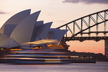 Sydney Opera House, UNESCO World Heritage Site, and Harbour Bridge at sunset, Sydney, New South Wales, Australia, Pacific